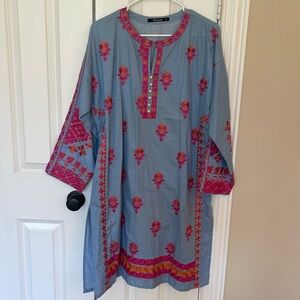 Indian Pakistani kurta with embroidery.